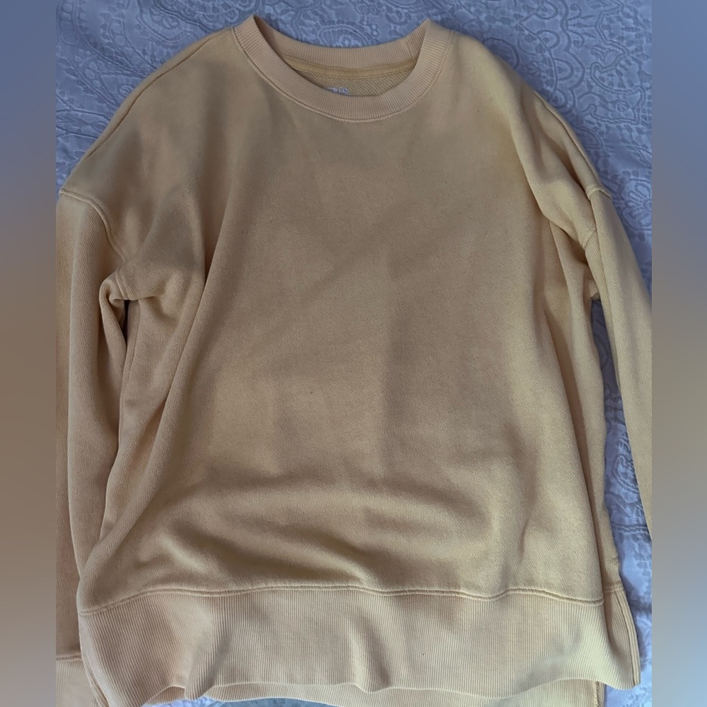 yellow sweatshirt